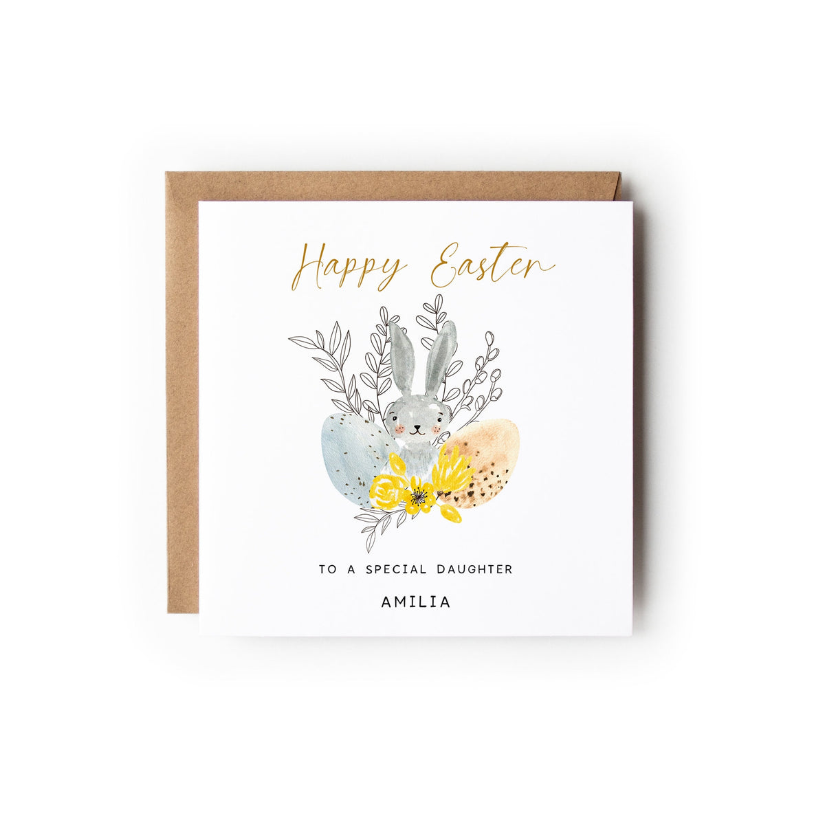 Easter Card with a cute little grey bunny hiding behind 2 Easter eggs, Text above reads Happy Easter and the text below reads To a special ... (insert title here eg couple, mum etc) with the names underneath.