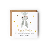 Easter Card with a cute little grey bunny upside down, Text below reads Happy Easter and the text below reads To a special ... (insert title here eg couple, mum etc) with the names underneath.